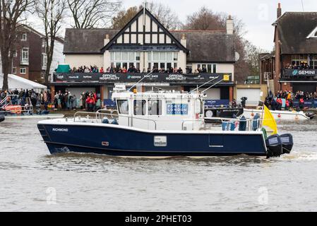 Port of London Authority Harbour Master vessel named Richmond on the River Thames at Chiswick, London, UK, for the University Boat Race 2023 Stock Photo