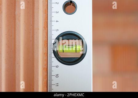 Close up of a spirit level in the plumb line Stock Photo