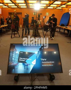 https://l450v.alamy.com/450v/2phfhm5/28-march-2023-hamburg-media-representatives-stand-in-room-151-waiting-for-the-start-of-the-state-press-conference-at-city-hall-the-senate-and-the-hamburg-transport-association-hvv-have-presented-the-new-fares-based-on-the-deutschland-ticket-advance-sales-for-the-49-euro-ticket-which-is-valid-throughout-germany-will-start-in-hamburg-next-monday-from-may-1-subscribers-to-the-deutschlandticket-will-be-able-to-use-all-local-and-regional-public-transportation-to-dpa-advance-sales-for-deutschlandticket-begin-in-hamburg-on-monday-photo-marcus-brandtdpa-2phfhm5.jpg