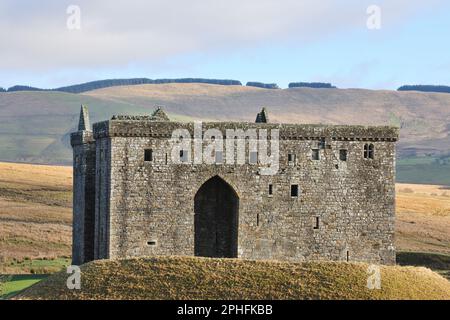 Hermitage Castle, a semi-ruined medieval castle dating back to the 1300's that is under the care of Historic Scotland, Liddlesdale, Roxburghshire. Stock Photo