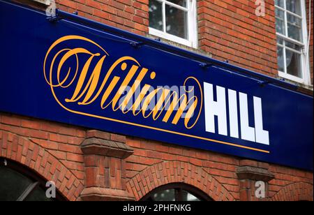 File photo dated 18/9/2016 of a sign for William Hill. Three gambling businesses owned by William Hill will pay a total of £19.2 million for 'widespread and alarming' social responsibility and anti-money laundering failures, the Gambling Commission has announced. The settlement is the largest in the Gambling Commission's history. Issue date: Tuesday March 28, 2023. Stock Photo