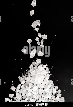 Salt on a black background Stock Photo
