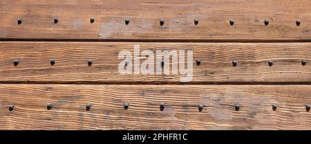 Wood background, texture. Wooden board planks with nails decoration, banner Stock Photo
