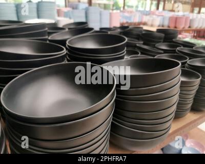 Stack of black bowls in a shop Stock Photo