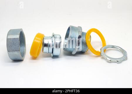 The steel cable gland is detached to reveal the internal components. Stock Photo