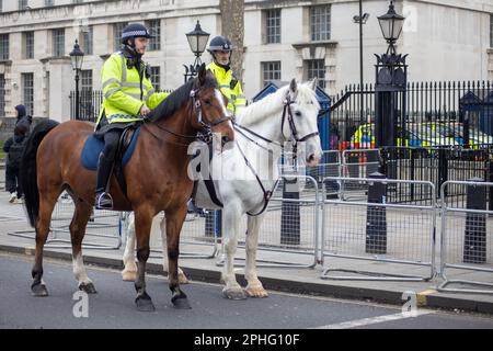 Metropolitan Police on a mission in Central London. Stock Photo