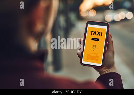 Woman ordering taxi online using mobile app on smart phone. Booking taxi using application online. Arranging taxi ride in downtown city street. Car sh Stock Photo