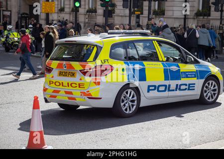 Metropolitan Police on a mission in Central London. Stock Photo