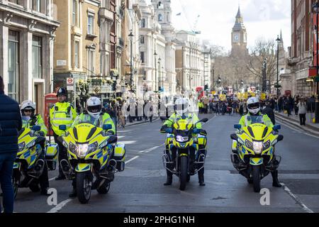 Metropolitan Police on a mission in Central London. Stock Photo