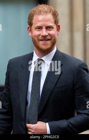 London, UK.  28 March 2023. Prince Harry leaves the High Court on day 2 of a pre-trial hearing.  Seven claimants, Prince Harry, Sir Elton John, David Furnish, Baroness Doreen Lawrence, Sadie Frost Law, Sir Simon Hughes and Elizabeth Hurley, allege serious criminal activity and unlawful information gathering by Associated Newspapers, publisher of the Daily Mail.  Credit: Stephen Chung / Alamy Live News Stock Photo