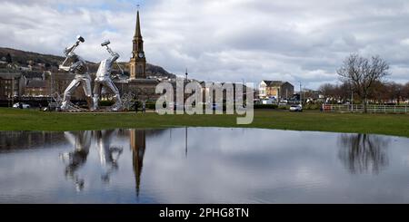 modern stainless steel sculpture The Shipbuilders of Port Glasgow by  artist John McKenna , Coronation Park,Port Glasgow,Inverclyde,Scotland,UK Stock Photo