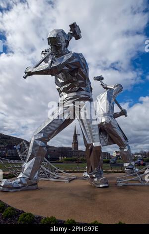 modern stainless steel sculpture The Shipbuilders of Port Glasgow by  artist John McKenna , Coronation Park,Port Glasgow,Inverclyde,Scotland,UK Stock Photo