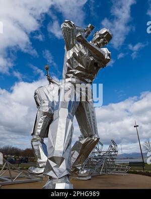 modern stainless steel sculpture The Shipbuilders of Port Glasgow by  artist John McKenna , Coronation Park,Port Glasgow,Inverclyde,Scotland,UK Stock Photo