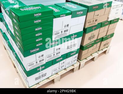 Samara, Russia - November 2, 2022: White paper for office equipment SvetoCopy in boxes a sold in a superstore Stock Photo