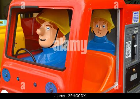 Coin operated kiddie car ride in Barry Island Pleasure Park, UK Stock Photo