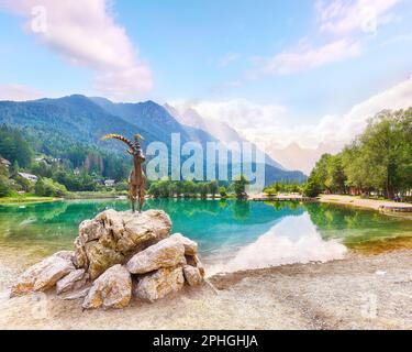 Amazing landscape on Jasna lake with beautiful reflections of the mountains. Nature scenery in Triglav national park. Location: Triglav national park. Stock Photo