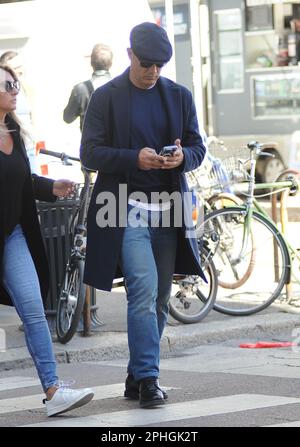 Milan, . 28th Mar, 2023. Milan, 03-28-2023 Fabio Cannavaro, former world champion footballer with the Italian national team in 2006, then coach in Arabia, China, and this year at Benevento in Serie B, walks through the streets of the center with his wife Daniela. Credit: Independent Photo Agency/Alamy Live News Stock Photo
