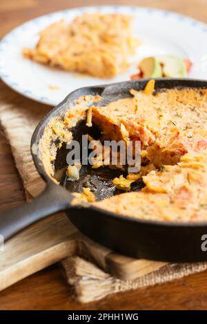Home made vegan rutabaga Frittata in a pan pepper using chickpea flour instead of eggs Stock Photo