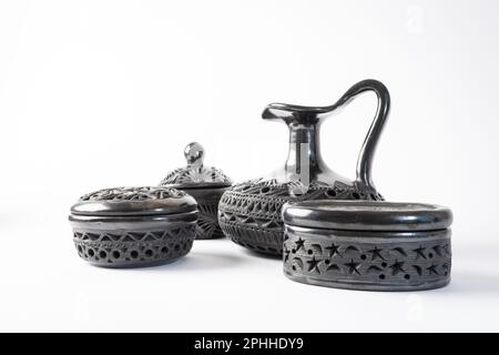 Typical Mexican handicraft. Set of black clay pots handmade in Oaxaca ...