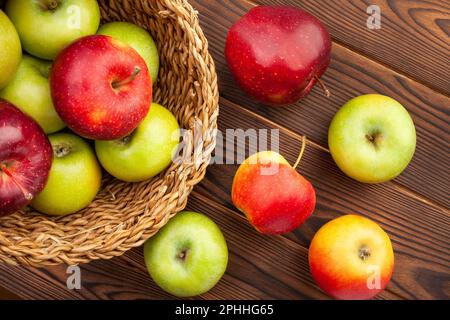 colorful apples on wood background Stock Photo
