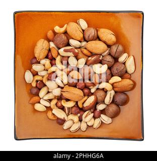 nut mix plate path isolated on white Stock Photo