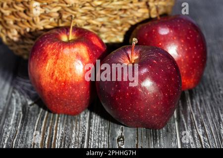 red apples on wood background Stock Photo