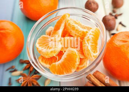 peeled tangerine on wood background Stock Photo