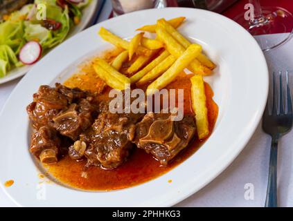 Oxtail in sauce - Rabo de toro. Spanish dish Stock Photo