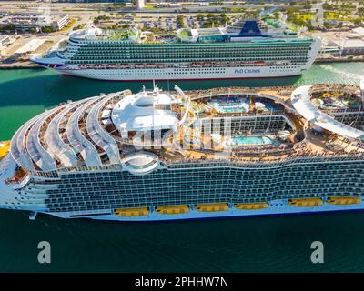 Miami, FL, USA - March 26, 2023: Aerial drone photo Allure of the Seas at Port Miami full of tourists traveling Stock Photo