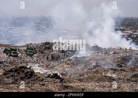 Nairobi, Kenya. 23rd Feb, 2023. Panoramic view of Dandora dumpsite. Dandora is the biggest dumpsite in East Africa and is the destination of the solid waste generated by Nairobi. It has been declared full in 1996 but is still operating and a lot of people, including children, go there looking for plastic, food or clothes they can sell. (Credit Image: © Simone Boccaccio/SOPA Images via ZUMA Press Wire) EDITORIAL USAGE ONLY! Not for Commercial USAGE! Stock Photo