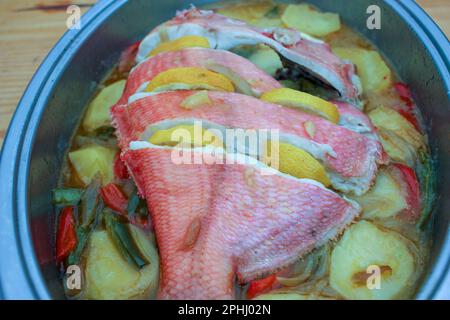 delicious red bream with potatoes for lunch made at home Stock Photo