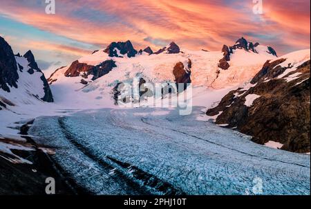 Sunrise Illuminates the Icefall of the Blue Glacier on Mt Olymus. Olympic National Park, Washington. Stock Photo