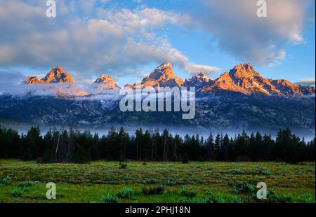 Sunrise on the Cathedral Group. Grand Teton National Park, Rocky Mountains, Wyoming Stock Photo