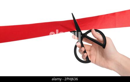 Woman Cutting Red Ribbon On Blurred Background. Festive Ceremony Stock 