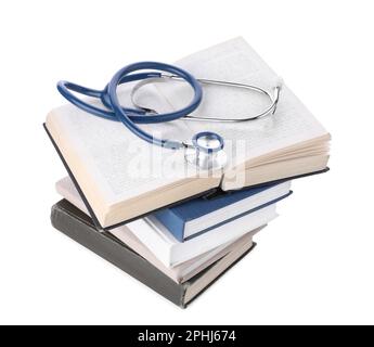 Stack of student textbooks and stethoscope on white background. Medical ...