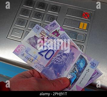 Cash point - Scottish bank notes, dispensed from a local ATM, Automatic Teller cash machine, Glasgow, Scotland, UK, G3 8AD Stock Photo