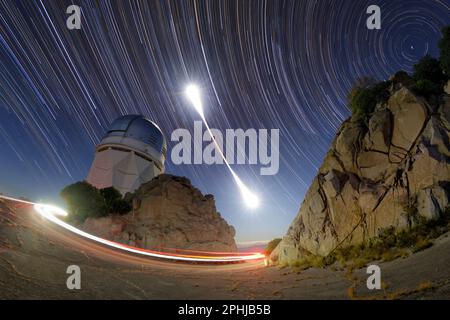 Nicholas U Mayall Telescope during a total lunar eclipse Stock Photo