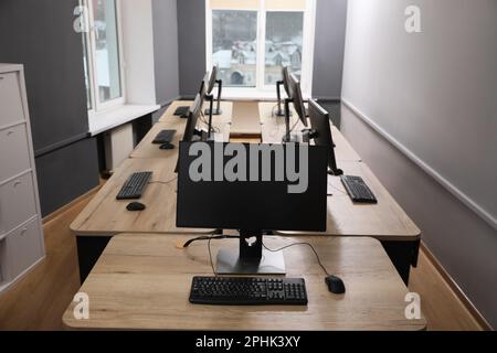 Many modern computers in open space office Stock Photo