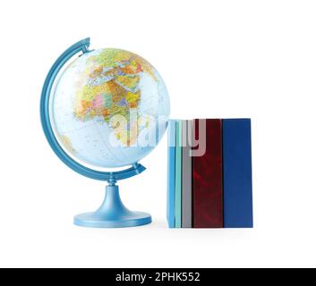 Plastic model globe of Earth and books on white background. Geography lesson Stock Photo