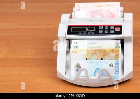 Philippine money - peso  in a counting machine Stock Photo