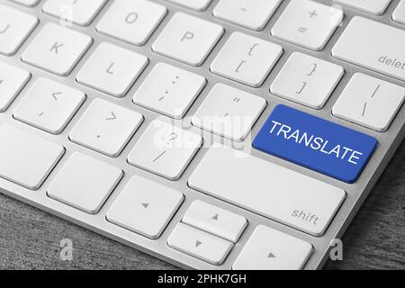 Blue button with word TRANSLATE on computer keyboard, closeup view Stock Photo