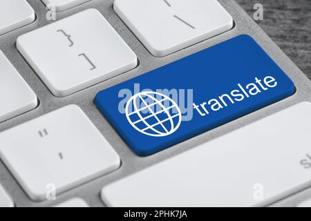Blue button with word TRANSLATE on computer keyboard, closeup view Stock Photo
