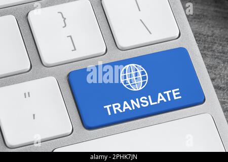 Blue button with word TRANSLATE on computer keyboard, closeup view Stock Photo