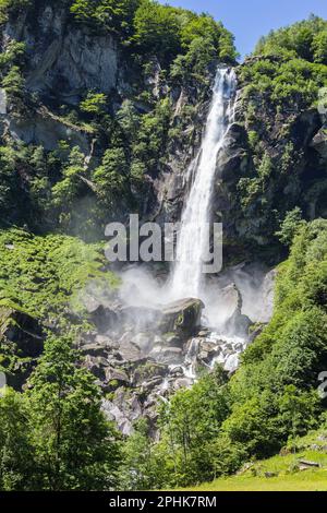 The famous waterfall over the Swiss beautiful village Foroglio in Swiss Alps in canton Tessin, Bavona valley, Switzerland, Europe Stock Photo