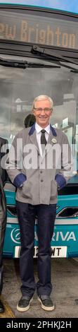 Paul O'Grady in his Birkenhead bus conductors uniform during filming for the BBC in 2012. Stock Photo