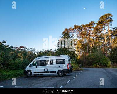Campervan parked on motorhome parking for overnight stay, Nijverdalseberg, Nijverdal, Overijssel, Netherlands Stock Photo