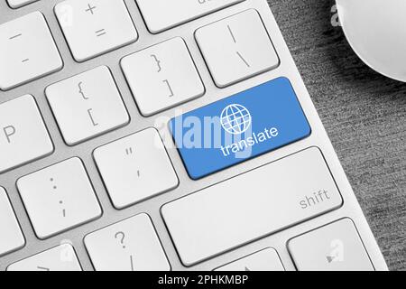 Blue button with word TRANSLATE on computer keyboard, closeup view Stock Photo