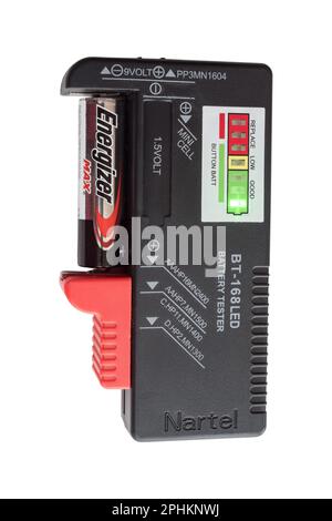 A portable hand held battery tester with a LED display isolated on a white background Stock Photo