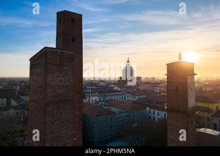 Aerial view of the old medieval towers of Pavia at sunset. Pavia, Lombardy, Italy, Europe. Stock Photo