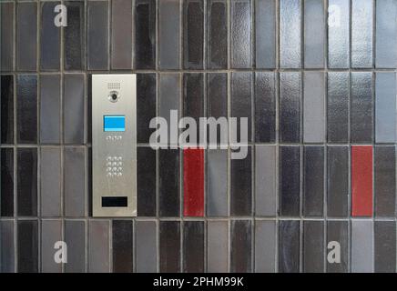 Secure Home System, Intercom Keypad, Using Door Phone, Doorphone, Entryphone, Videophone Call, Digital Electronic Doorbell Stock Photo